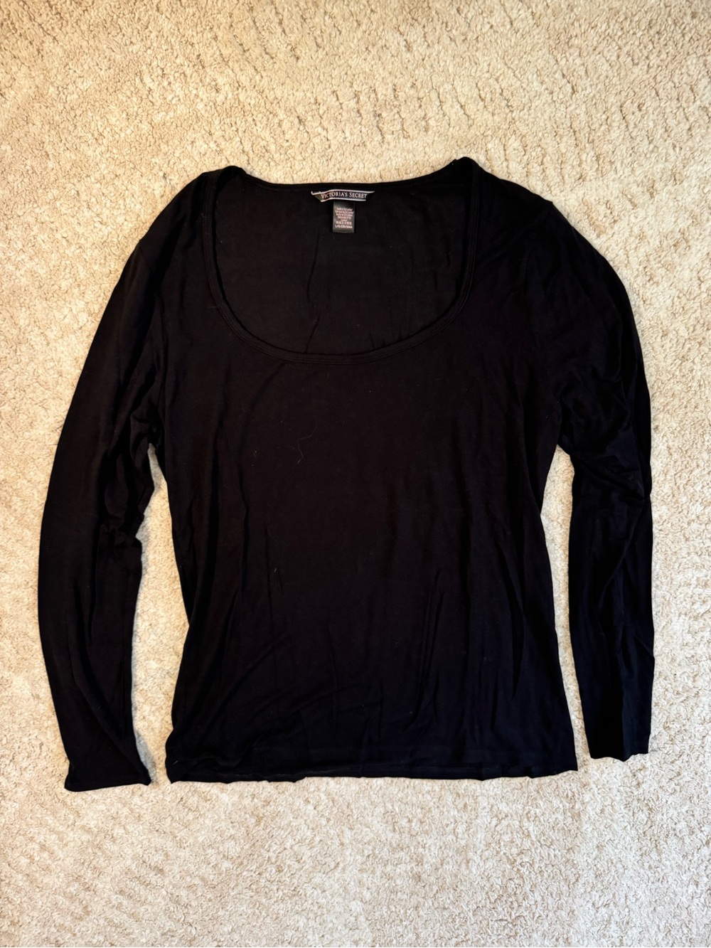 Victoria’s Secret solid black lightweight long sleeve. Size L.
